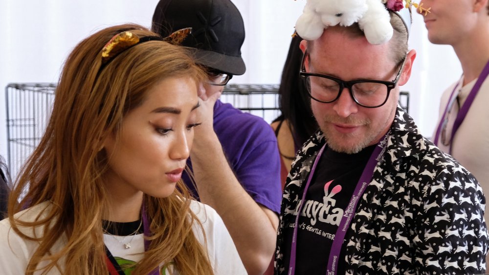 Brenda Song, Macaulay Culkin looking down at a Bunny Ears event