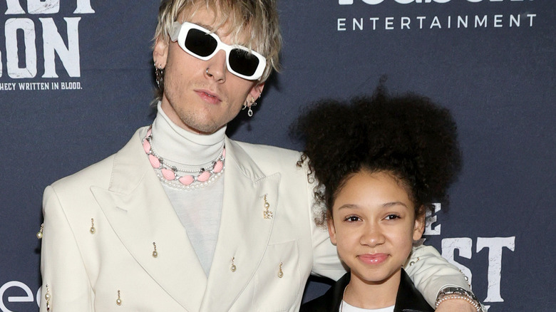 Machine Gun Kelly and his daughter at a New York film event