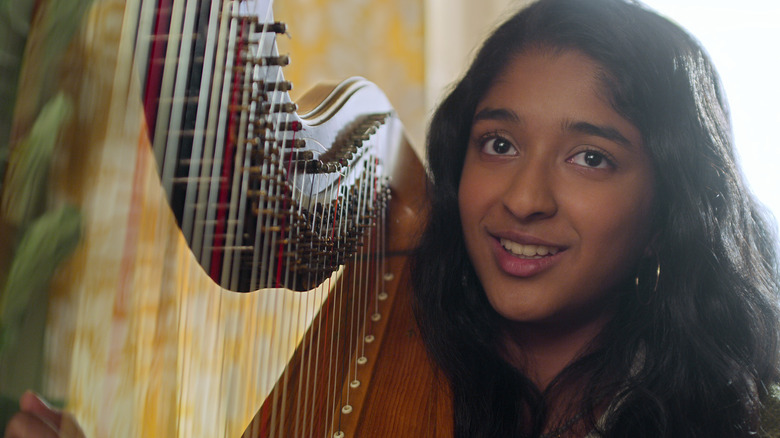 Maitreyi Ramakrishnan with harp in Never Have I Ever