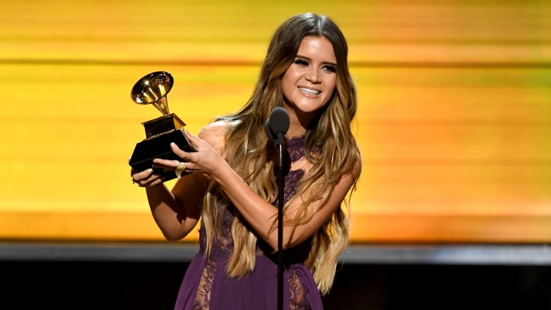 Maren Morris holding a Grammy award