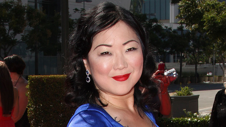 Margaret Cho smiling in blue dress 