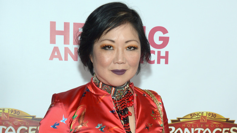 Margaret Cho with collar and red top