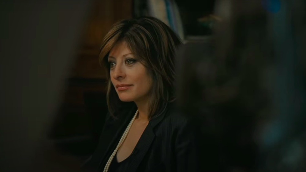 Maria Bartiromo looking to the side