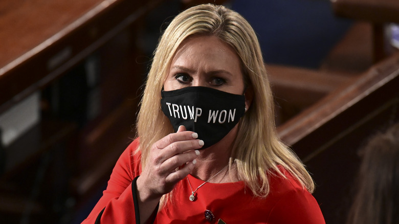 Marjorie Taylor Greene wearing a 'Trump Won' face mask