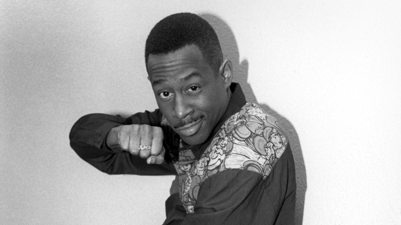 Martin Lawrence displaying his fist