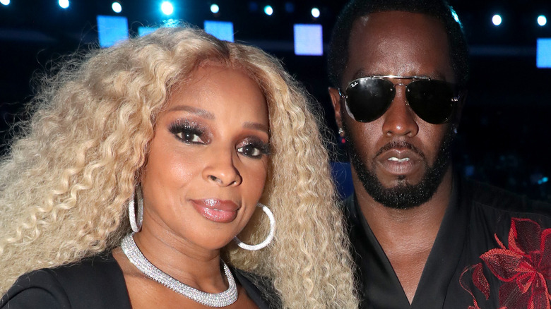 Mary J. Blige and Diddy posing together
