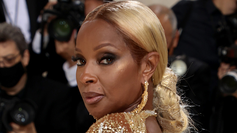 Mary J. Blige in a gold dress