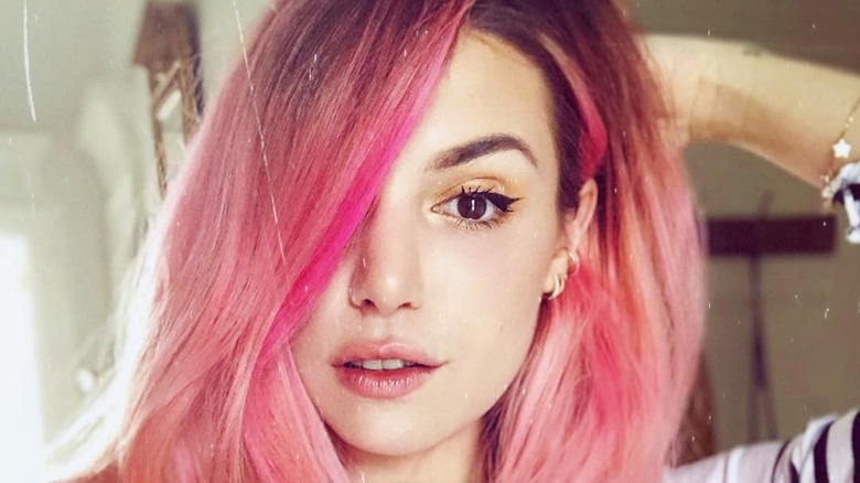 Marzia posing with pink hair