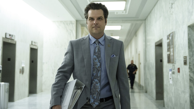 Matt Gaetz walking down hall