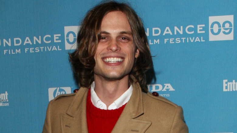 Matthew Gray Gubler with long hair smiling 