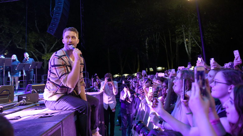 Matthew Morrison performing in Central Park