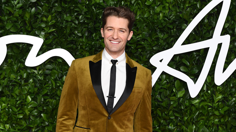 Matthew Morrison posing at event