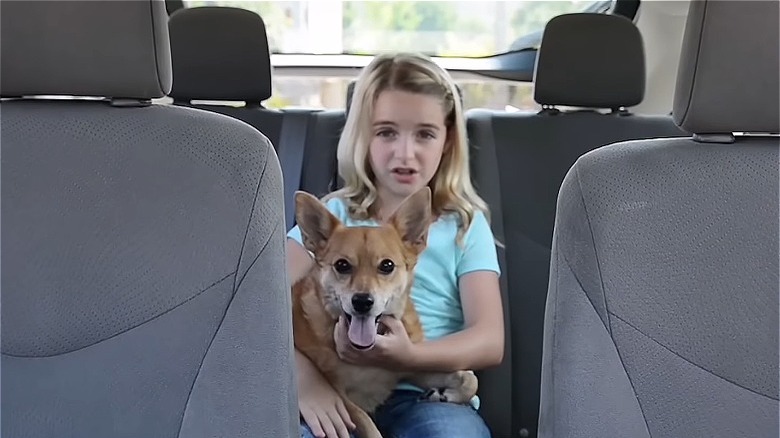 Mckenna Grace holding cute dog