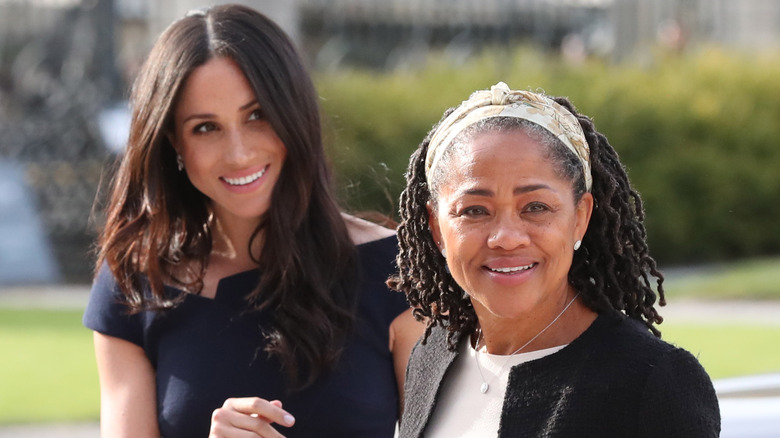 Meghan Markle posing with her mom, Doria Ragland