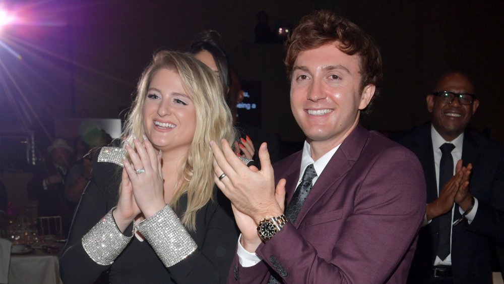 Meghan Trainor and Daryl Sabara both clapping