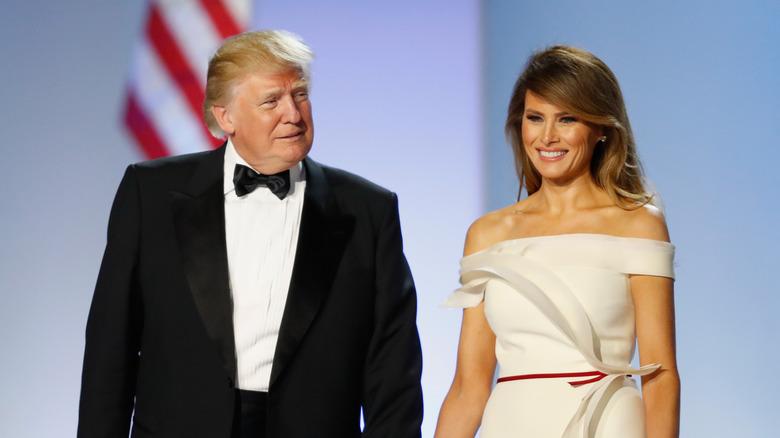 Melania and Donald Trump pose for cameras together