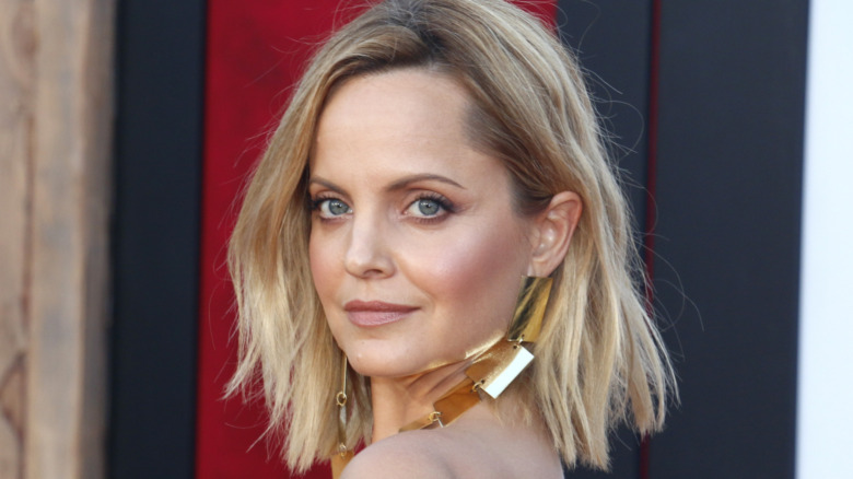 Mena Suvari looking at camera