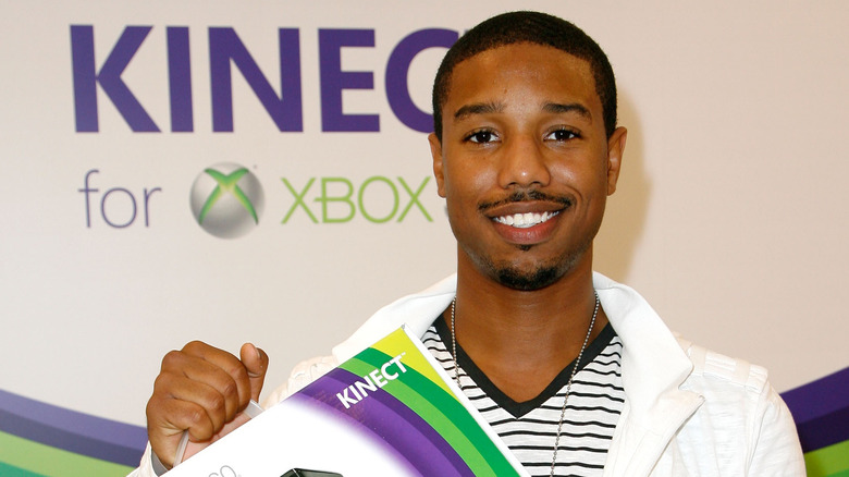 Michael B. Jordan in 2010 with Kinect, smiling