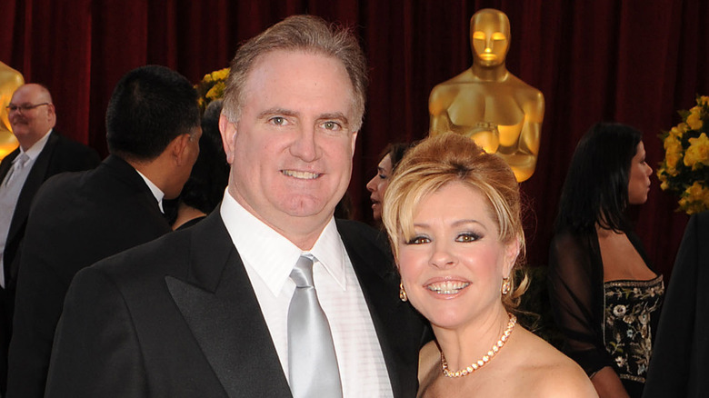 Sean and Leigh Anne Tuohy smiling Oscars