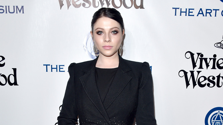 Michelle Trachtenberg with hair pulled back at the Art of Elysium event