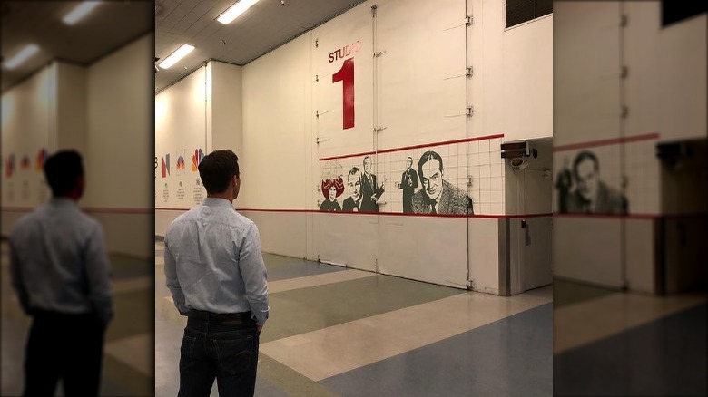 Mike Richards standing behind soundstage