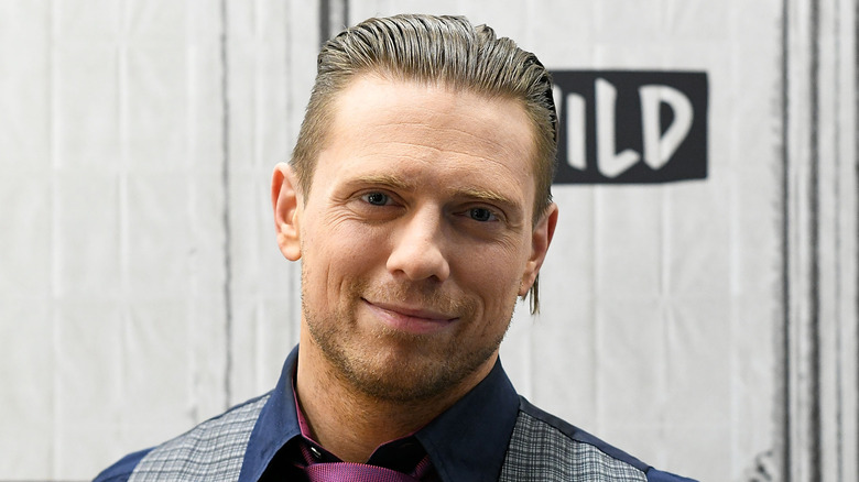 Mike Mizanin with slicked back hair