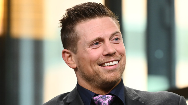 Mike Mizanin in a purple tie