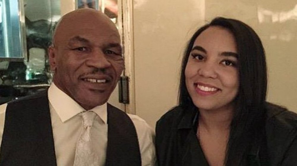 Mike Tyson and Rayna Tyson smiling at Mr. Chow's in Hollywood 