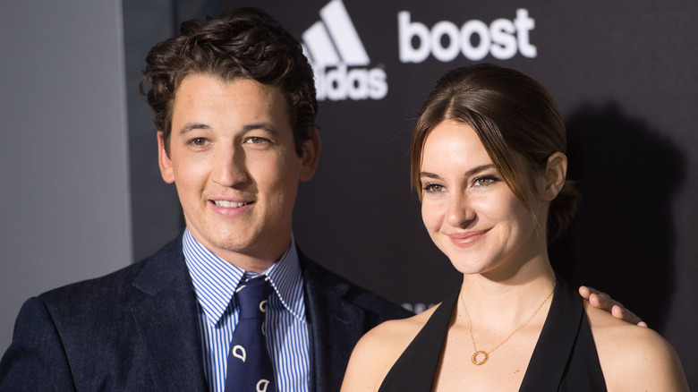 Miles Teller and Shailene Woodley posing