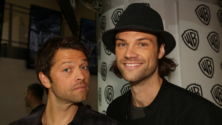 Misha Collins and Jared Padalecki  posing