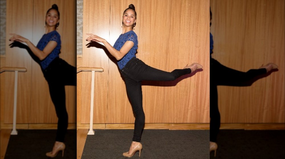 Misty Copeland playfully striking a ballet pose