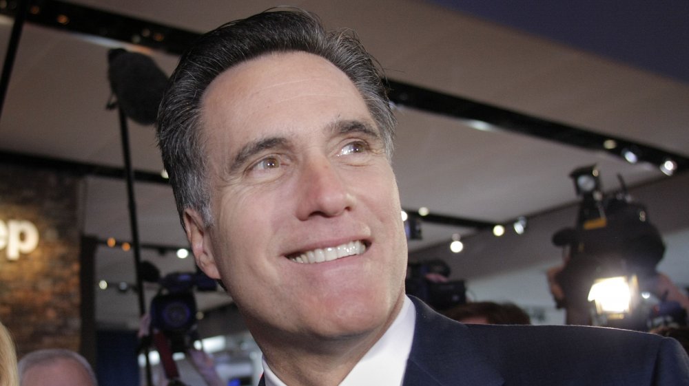 Mitt Romney smiling at the 2008 North American International Auto Show 