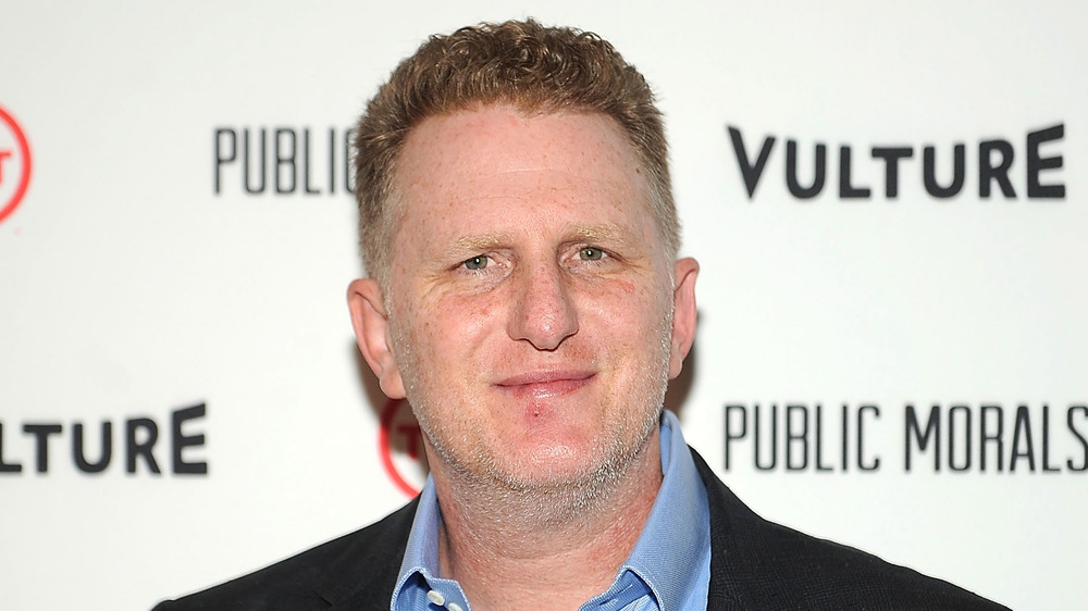 Michael Rapaport smiling at camera