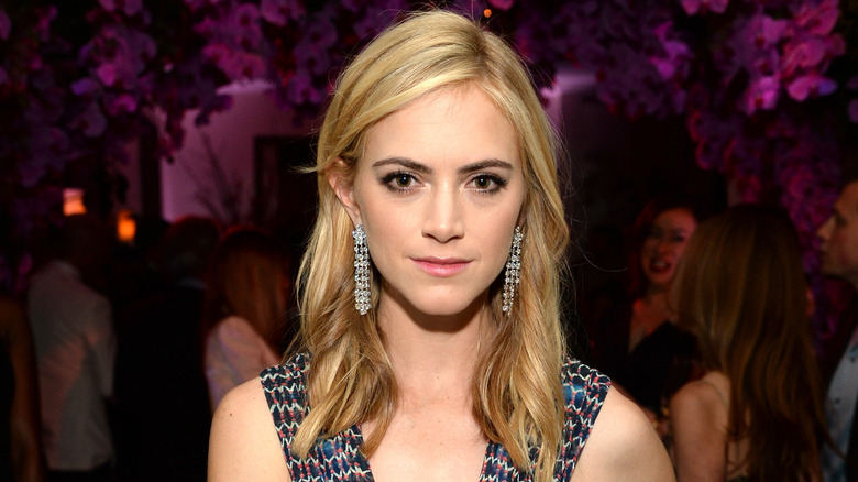 Emily Wickersham with purple background