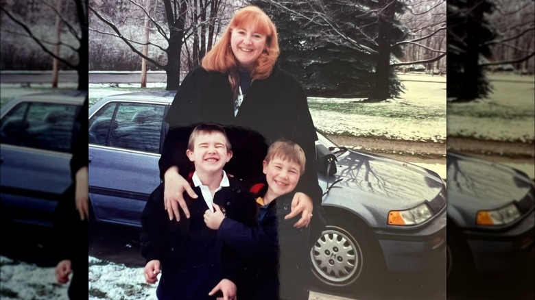 Donna Kelce outdoors with young Jason and Travis Kelce