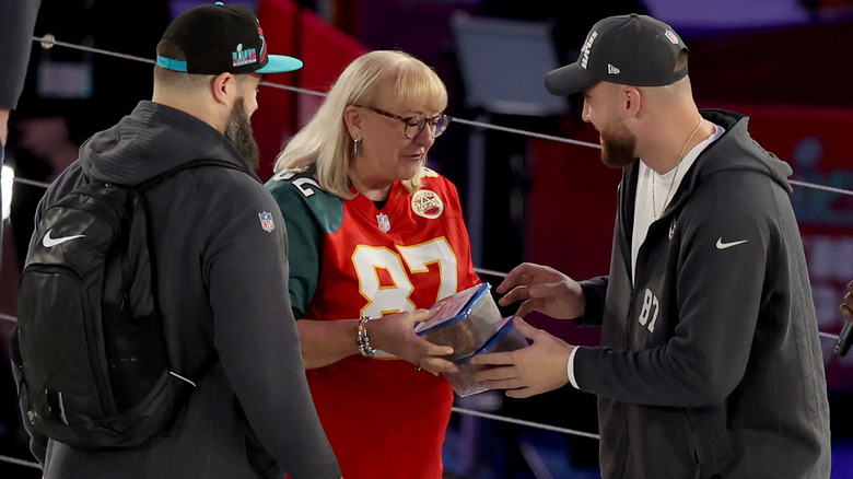 Donna Kelce giving sons cookies