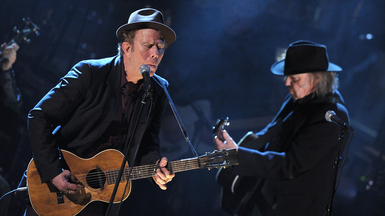 Tom Waits performing on stage