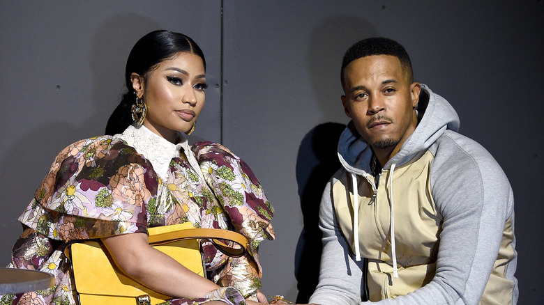 Nicki Minaj and Kenneth Petty, seated and posing