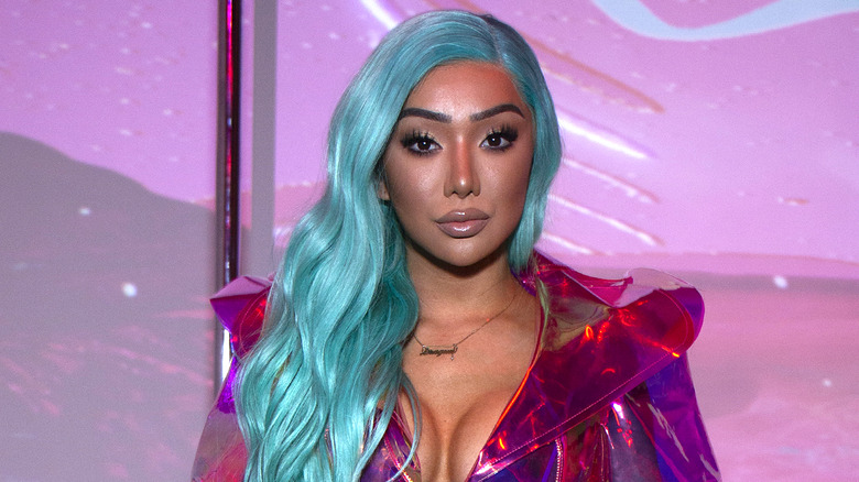 Nikita Dragun posing at an event