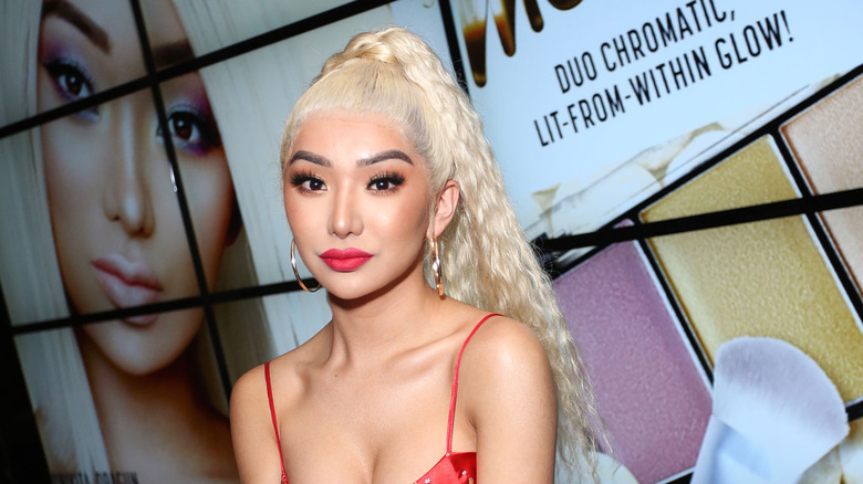 Nikita Dragun posing at an event