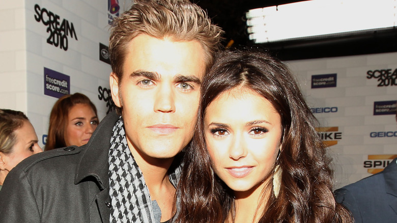 Paul Wesley and Nina Dobrev posing cheek-to-cheek