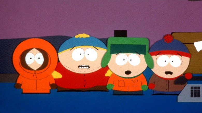 Stan Marsh, Kyle Broflovski, Kenny McCormick and Eric Cartman standing together