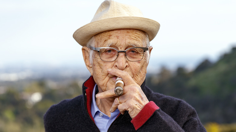 Norman Lear smoking a cigar