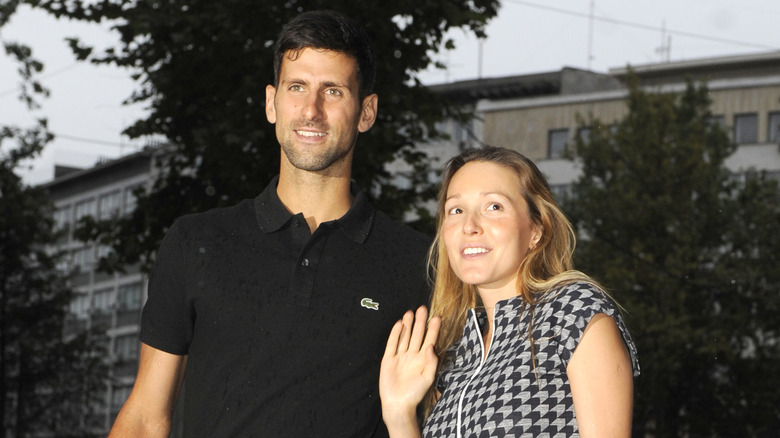 Novak Djokovic posing with his wife Jelena