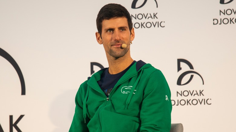 Novak Djokovic on stage during an event