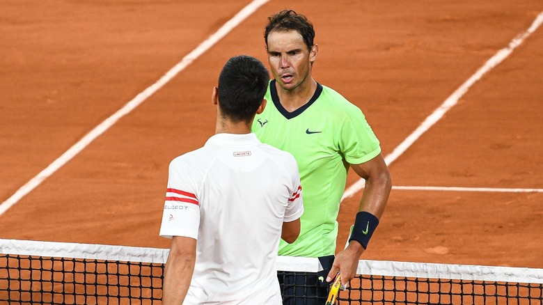 Rafael Nadal and Novak Djokovic shaking hands after a match