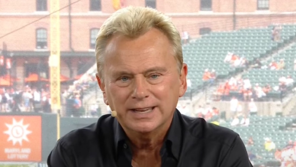 Pat Sajak speaking during a baseball interview