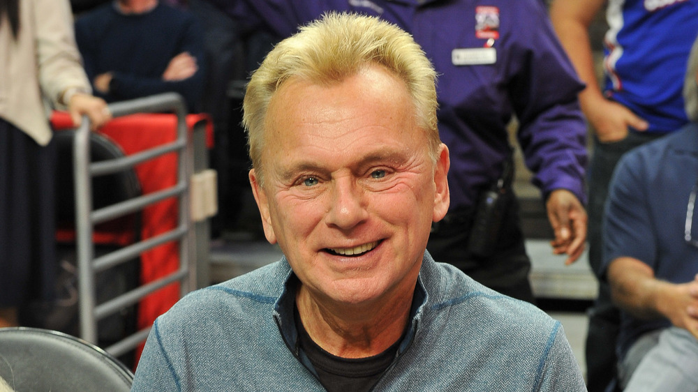 Pat Sajak smiling at a baseball game