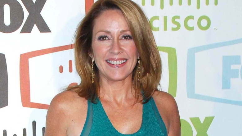 Patricia Heaton in turquoise dress