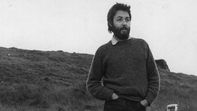 Paul McCartney on his farm, standing